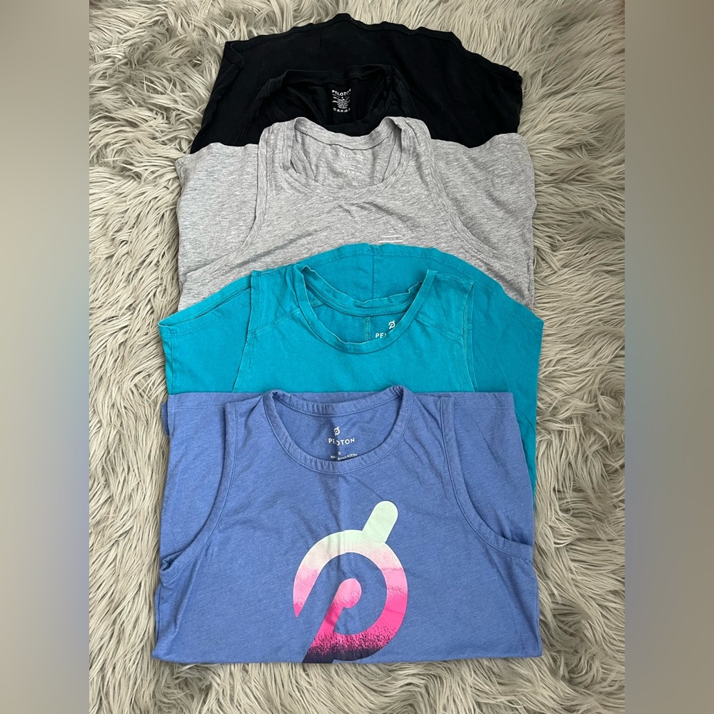 Women’s Peloton workout shirts. Great condition size Small